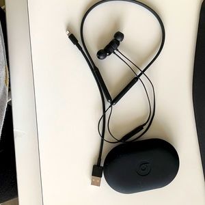 Beats by Dre headphones, case, and charger